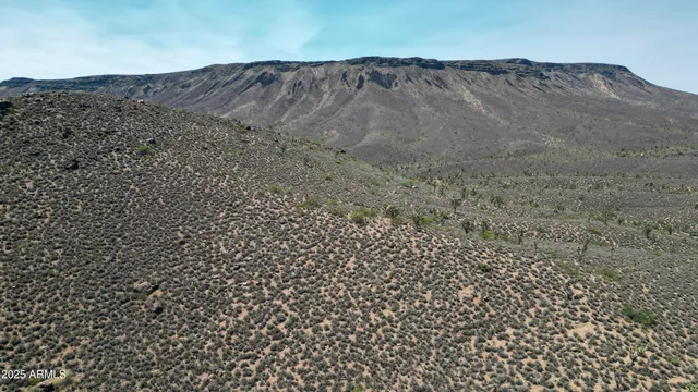 a view of mountains and valleys