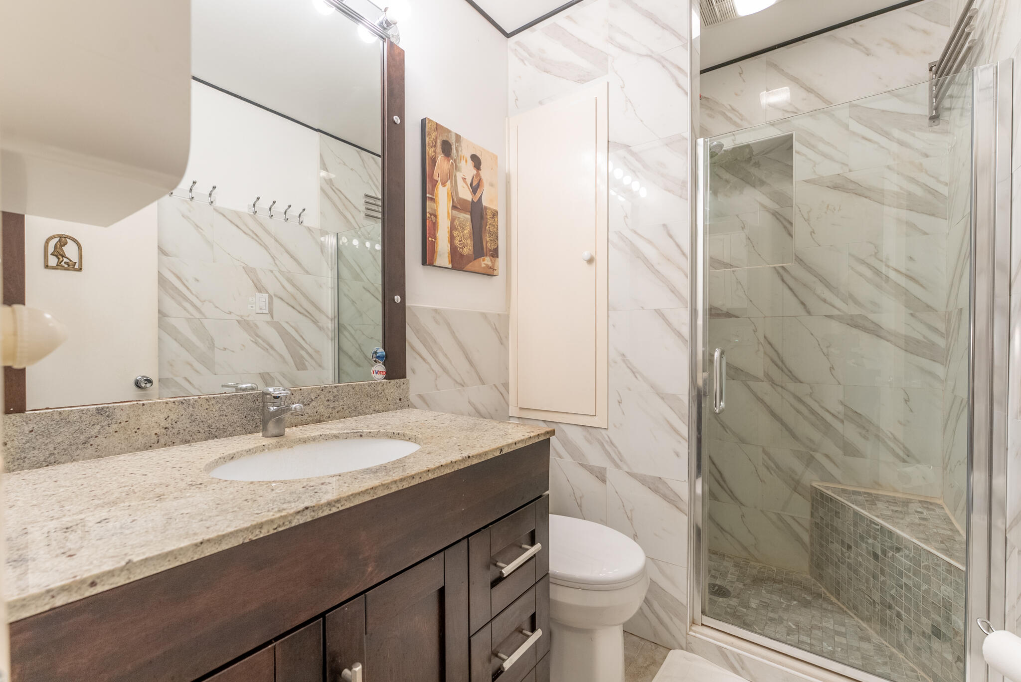 722 Ridge Road, Unit 1 Lantana, FL 33462 - Photo 15 of 20 a bathroom with a granite countertop sink toilet and shower