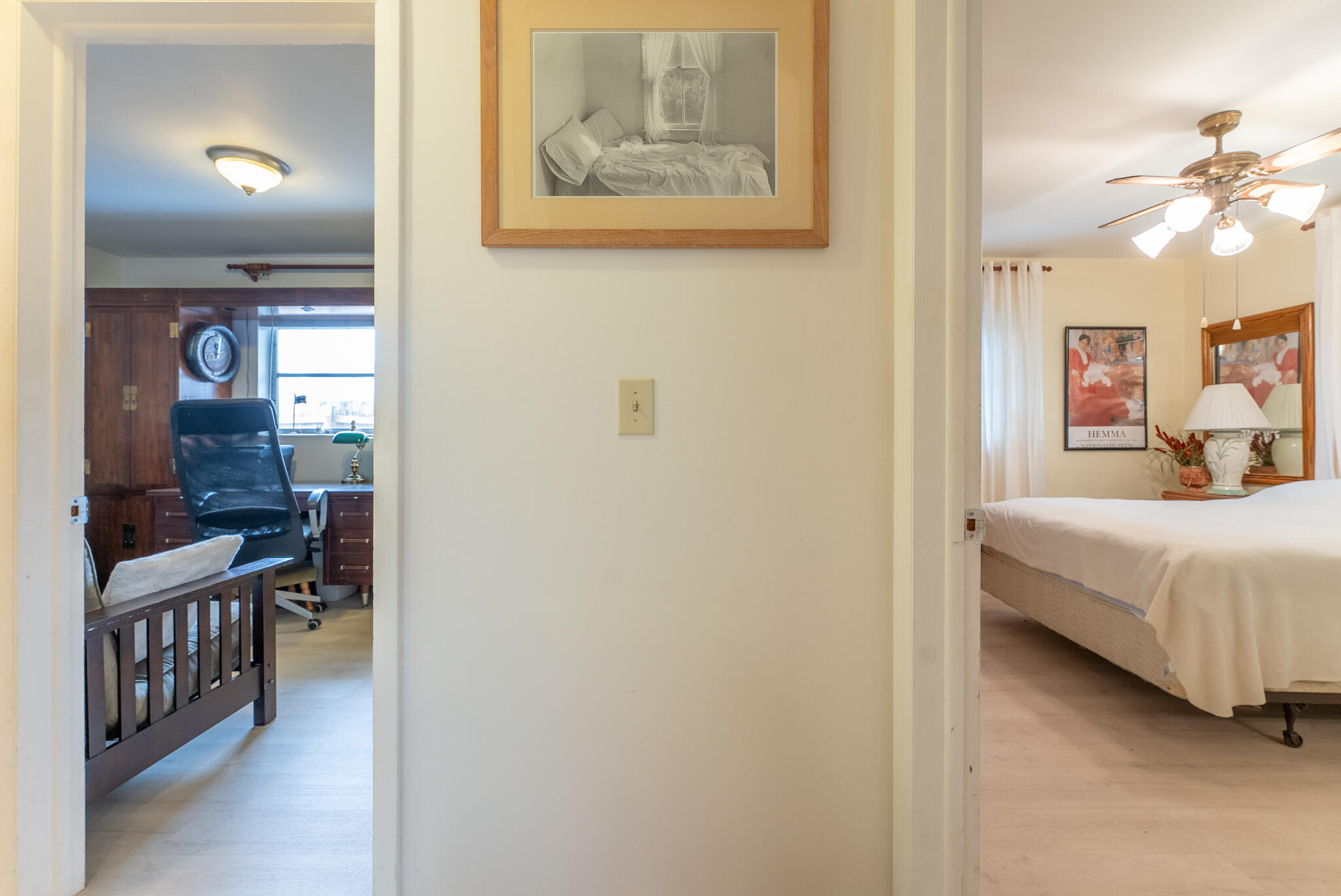 722 Ridge Road, Unit 1 Lantana, FL 33462 - Photo 16 of 20 a bedroom with a bed and a chandelier