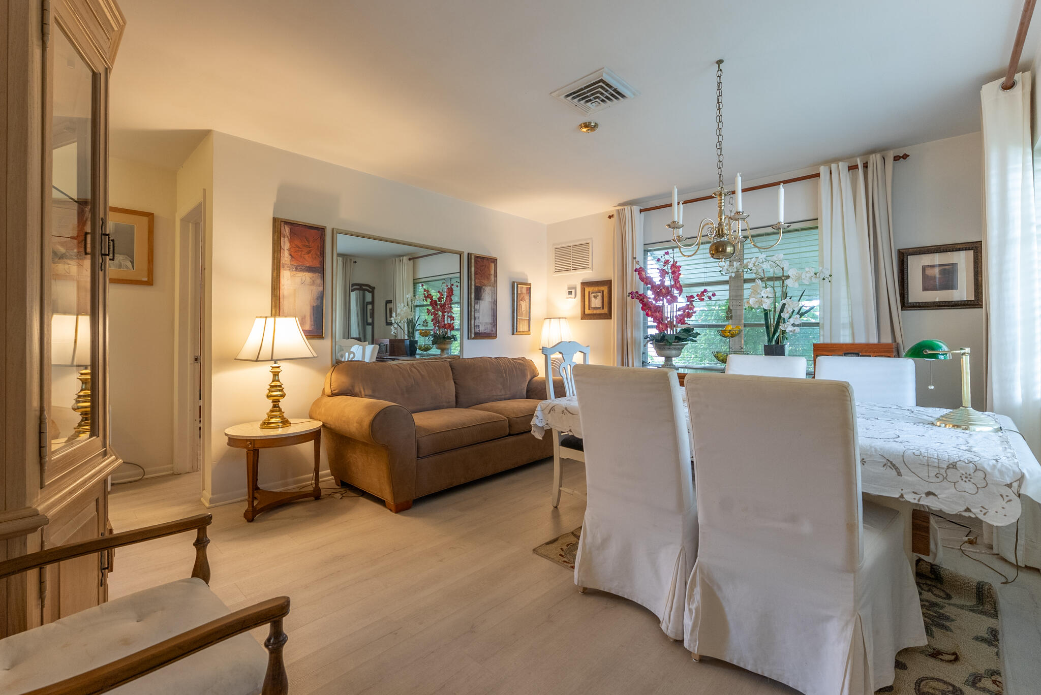 722 Ridge Road, Unit 1 Lantana, FL 33462 - Photo 7 of 20 a living room with furniture and a flat screen tv