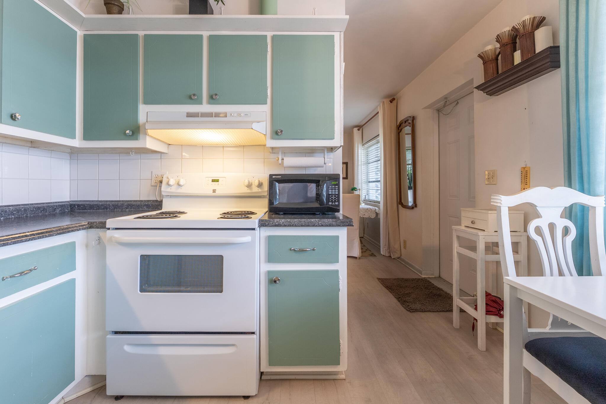 722 Ridge Road, Unit 1 Lantana, FL 33462 - Photo 10 of 20 a kitchen with a refrigerator and a stove