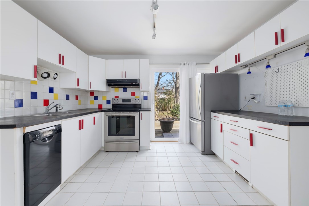9 Spruce Avenue Middletown, RI 02842 - Photo 13 of 38 Kitchen is 10'11" x 11'3". It has an induction stove!