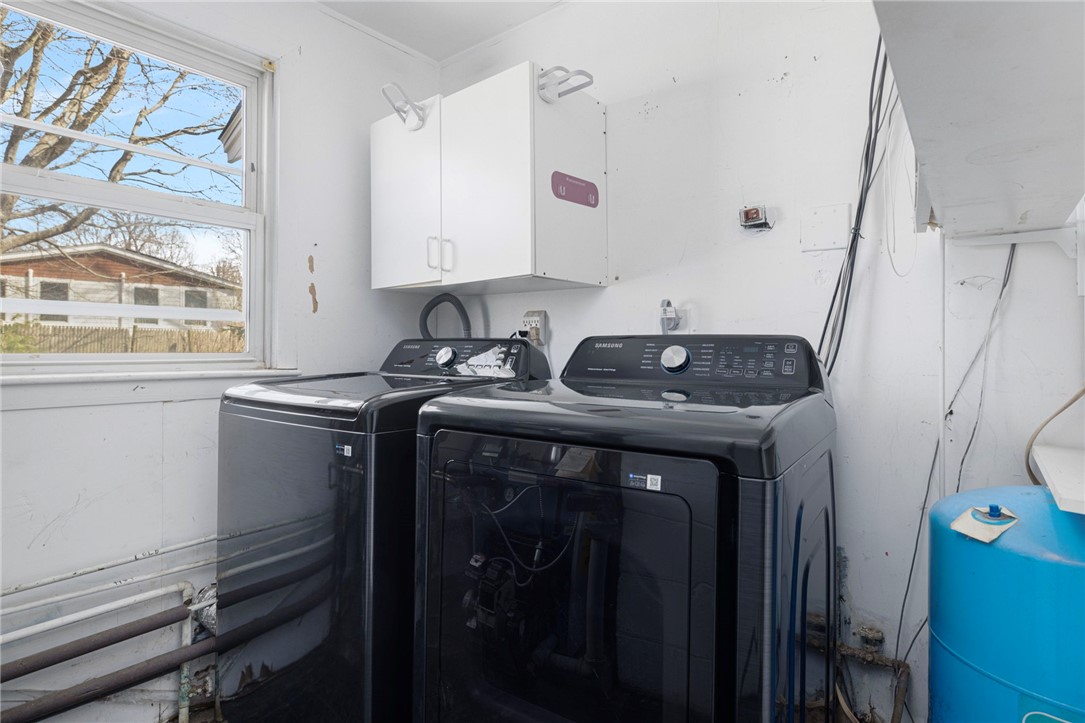 9 Spruce Avenue Middletown, RI 02842 - Photo 27 of 38 Laundry and whole house filtration system in hall.