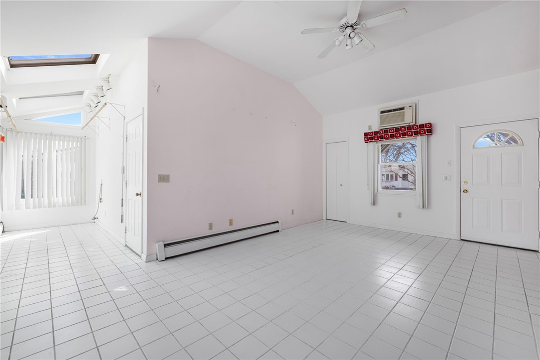 9 Spruce Avenue Middletown, RI 02842 - Photo 28 of 38 Great family room addition, has its own entry and rear door too! This space is 26'8" x 19'7".