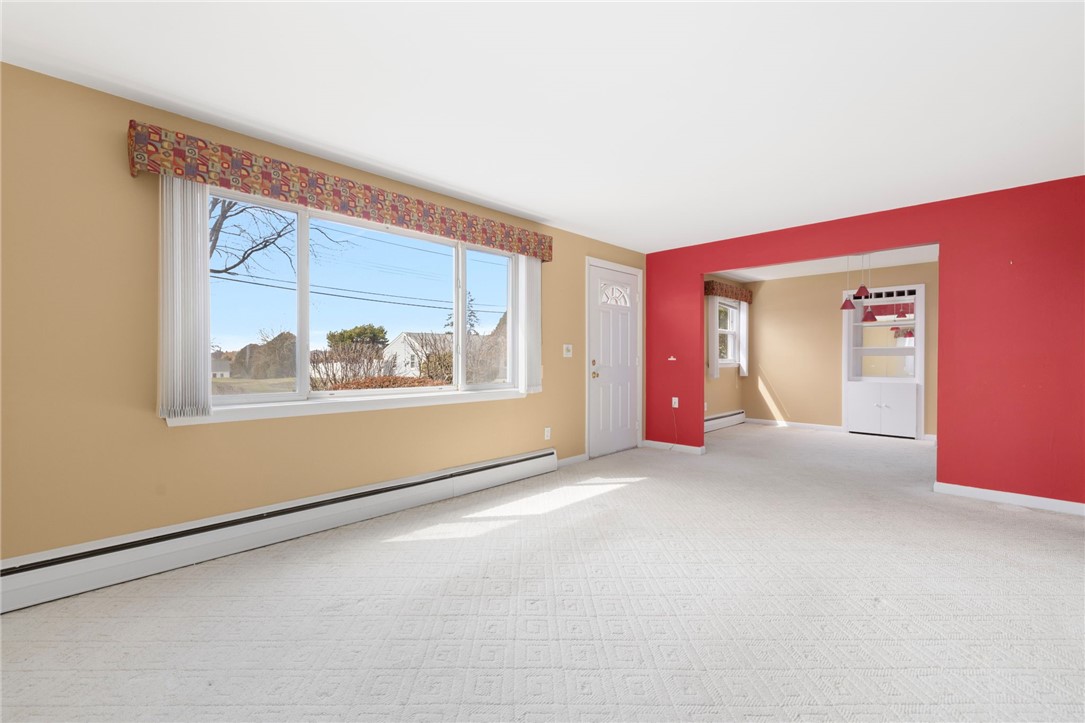 9 Spruce Avenue Middletown, RI 02842 - Photo 8 of 38 Dining Room is just off the living room.