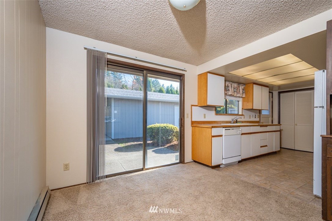 18630 Albany Street Southwest Rochester, WA 98579 - Photo 14 of 21 a large room with lot of cabinets