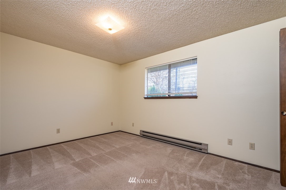 18630 Albany Street Southwest Rochester, WA 98579 - Photo 18 of 21 an empty room with windows