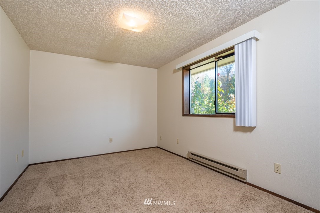 18630 Albany Street Southwest Rochester, WA 98579 - Photo 10 of 21 an empty room with a window