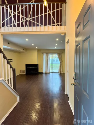 a view of livingroom with furniture and wooden floor