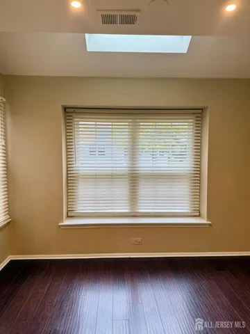 a view of a room that has a window