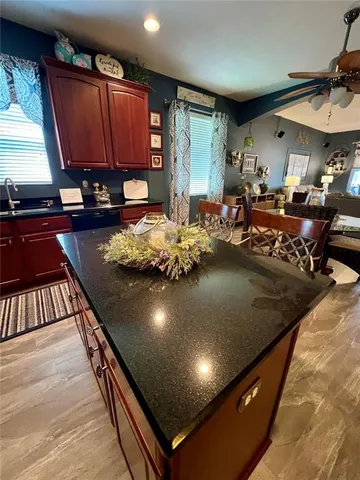 a bathroom with a toilet a sink and a mirror