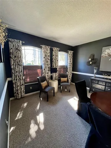 a spacious bedroom with a bed and walk in closet