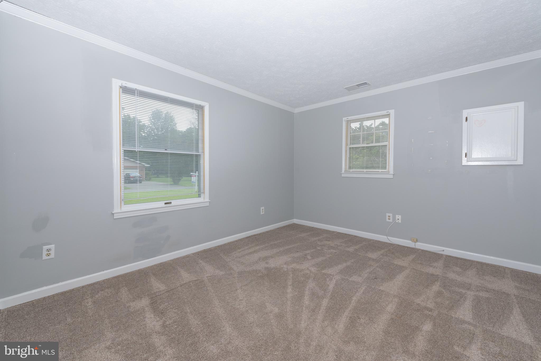 401 Kent Way Stevensville, MD 21666 - Photo 12 of 22 an empty room with windows