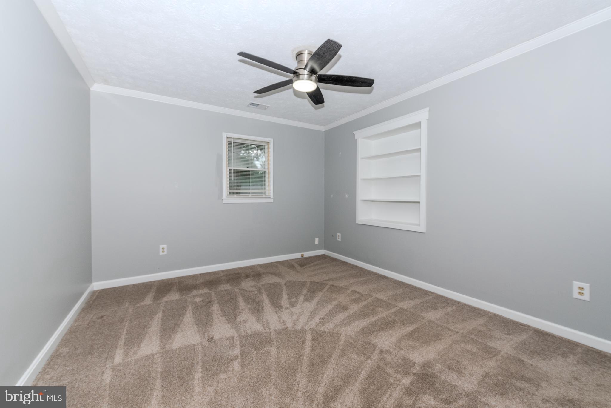401 Kent Way Stevensville, MD 21666 - Photo 15 of 22 a view of an empty room with a window