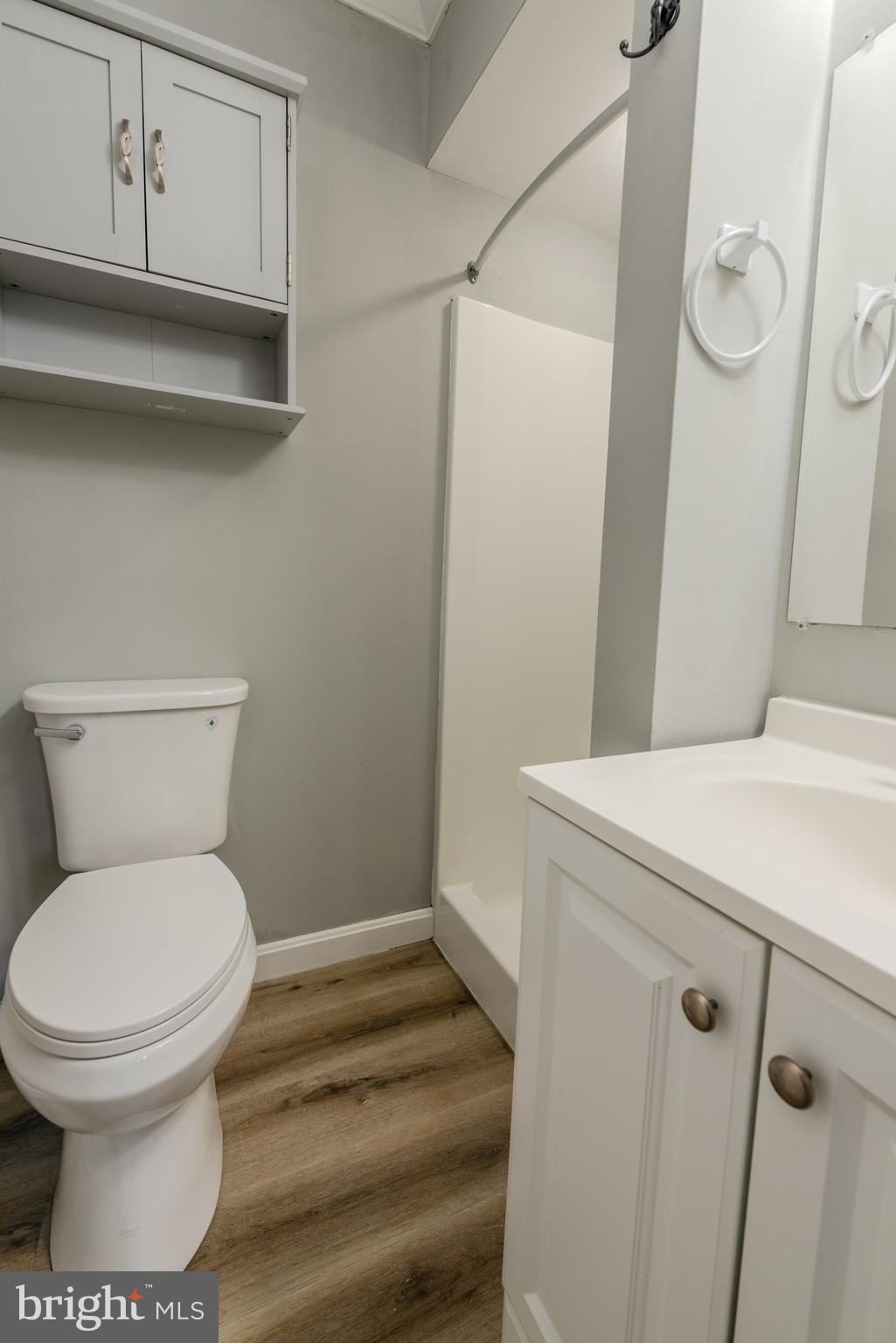 401 Kent Way Stevensville, MD 21666 - Photo 16 of 22 a bathroom with a toilet and a sink