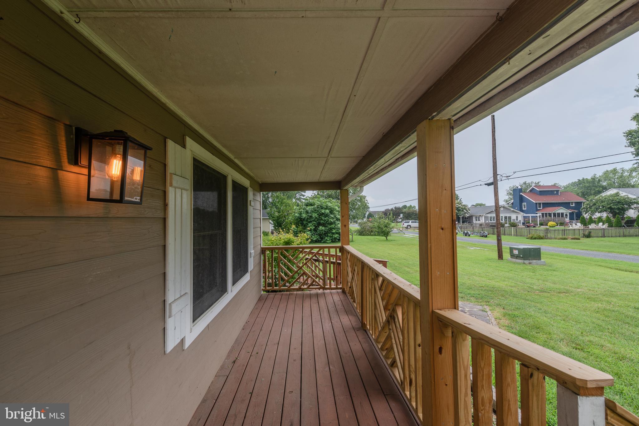 401 Kent Way Stevensville, MD 21666 - Photo 22 of 22 a view of a deck with a big yard