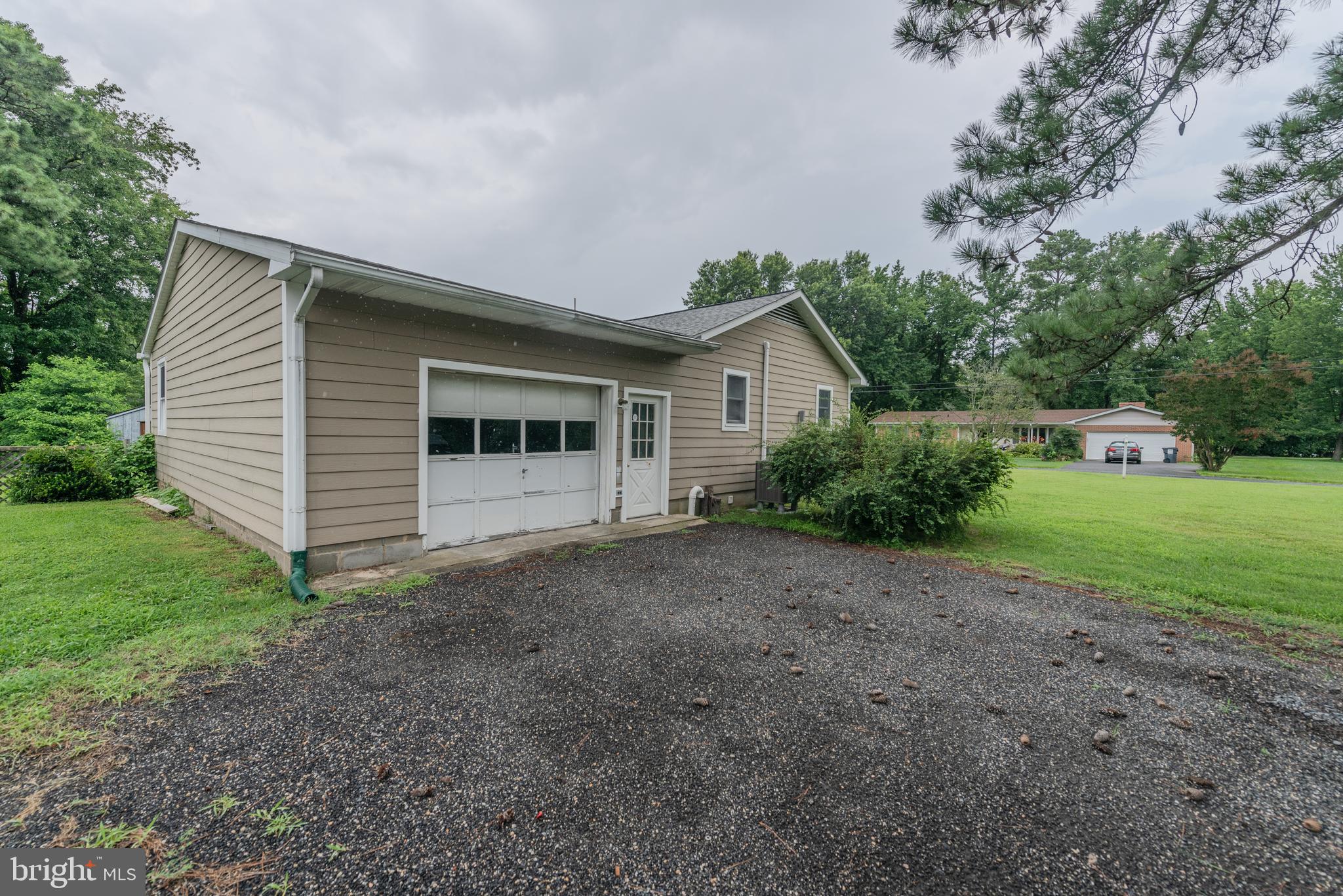 401 Kent Way Stevensville, MD 21666 - Photo 4 of 22 a view of a house with backyard and garden