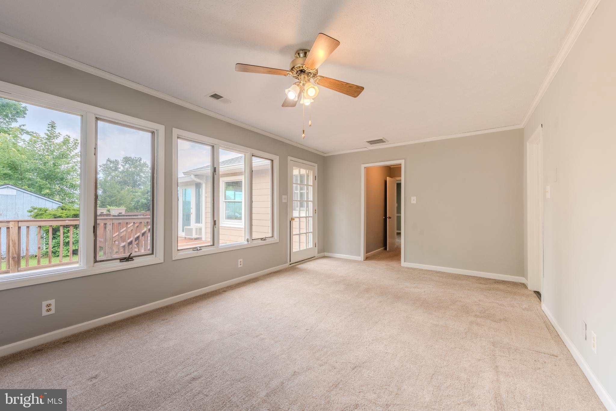 401 Kent Way Stevensville, MD 21666 - Photo 8 of 22 a view of an empty room with a window