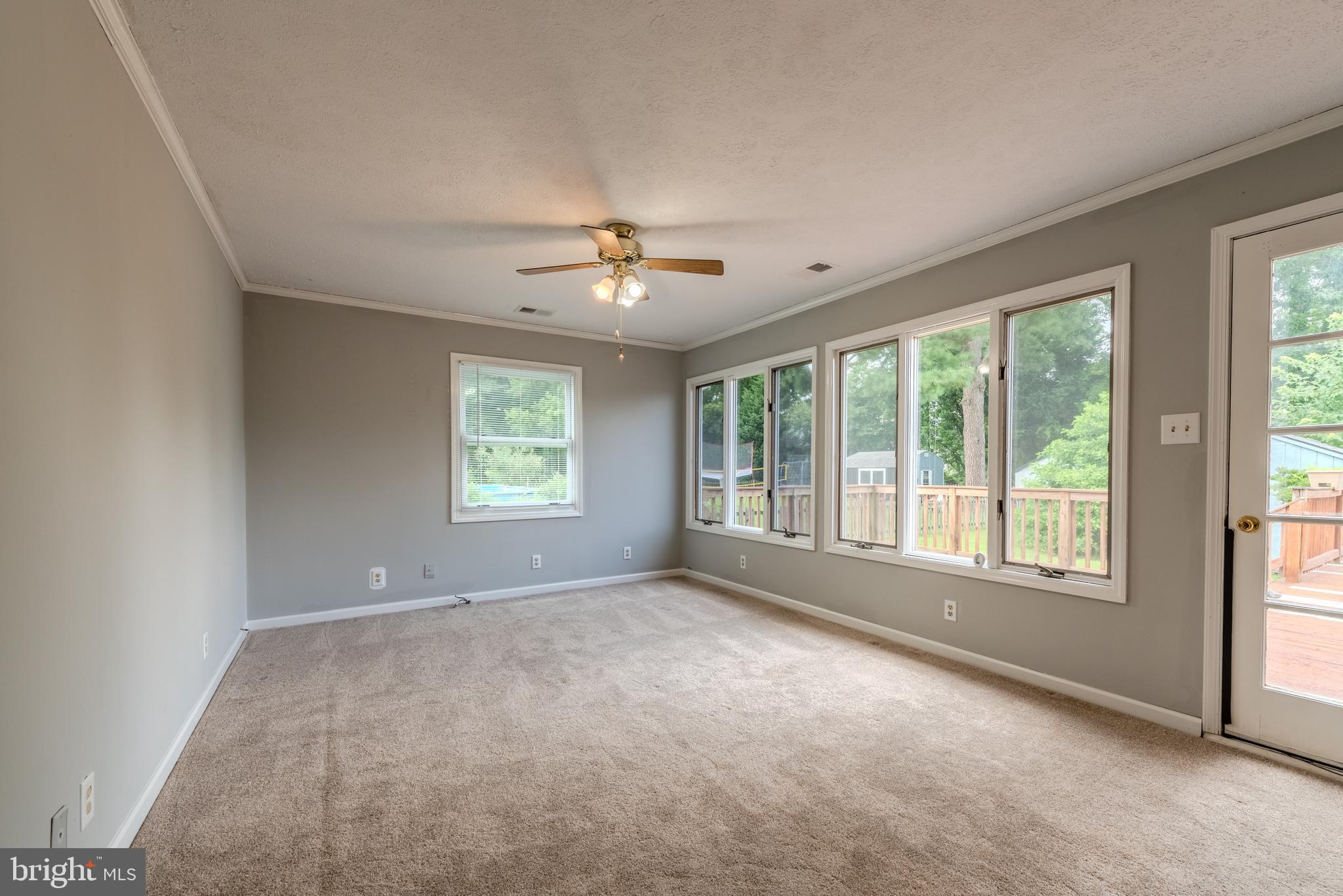 401 Kent Way Stevensville, MD 21666 - Photo 9 of 22 a view of an empty room with a window