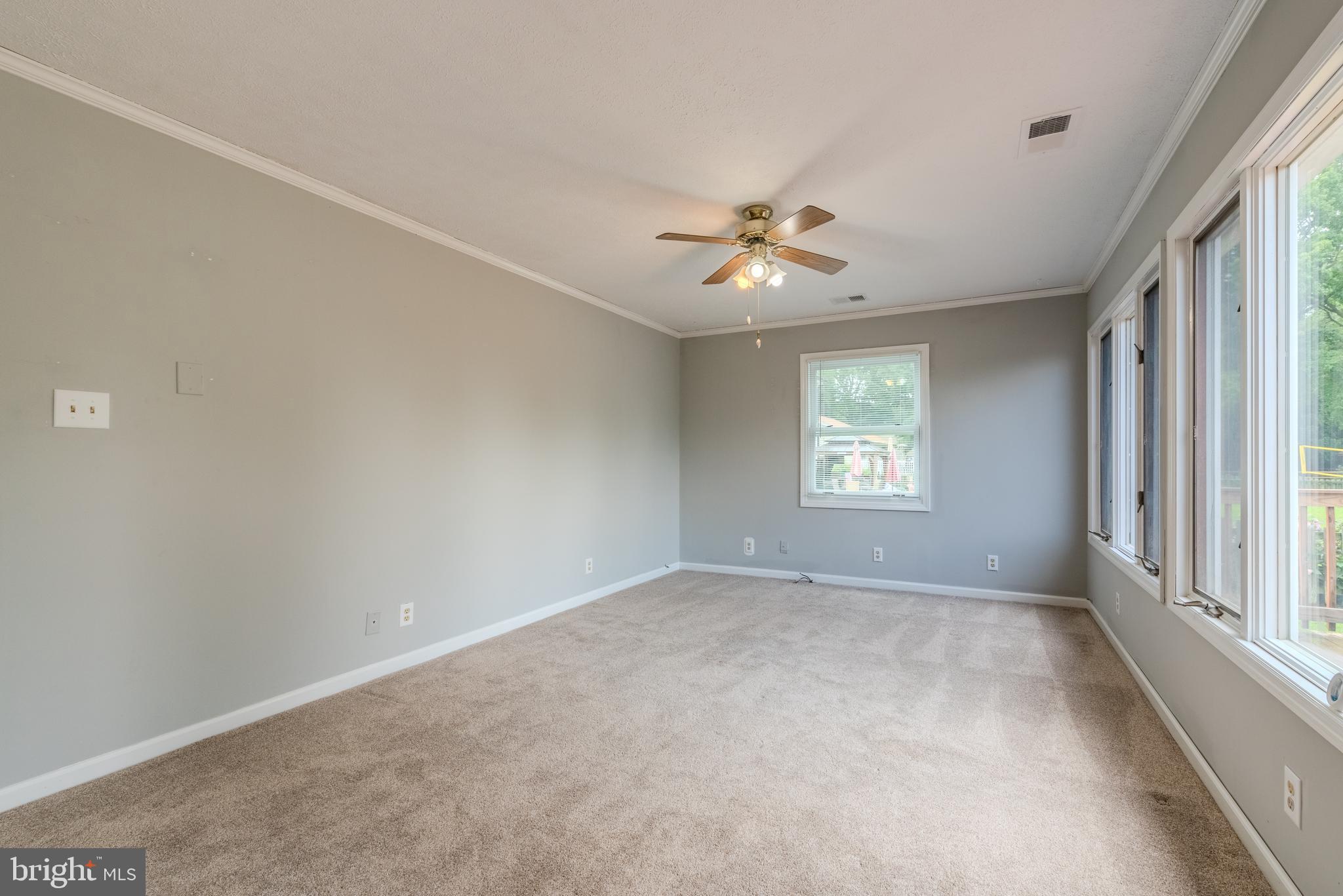 401 Kent Way Stevensville, MD 21666 - Photo 10 of 22 an empty room with a window