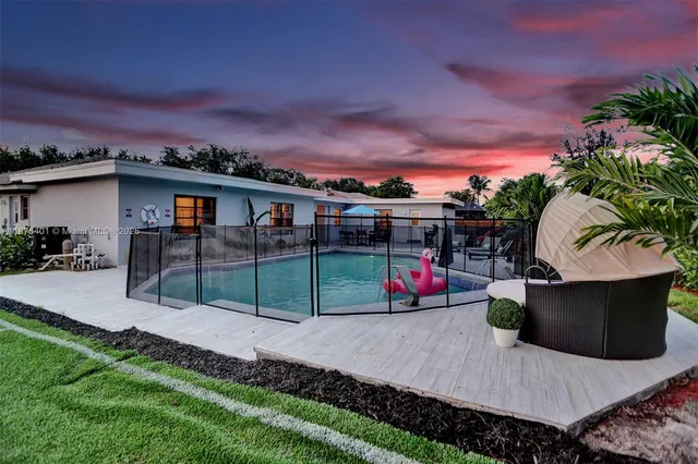 a bedroom with furniture and shower