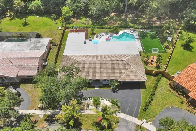 a bedroom with bed and a window