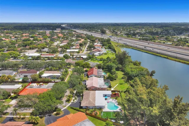 a bathroom with a shower and toilet