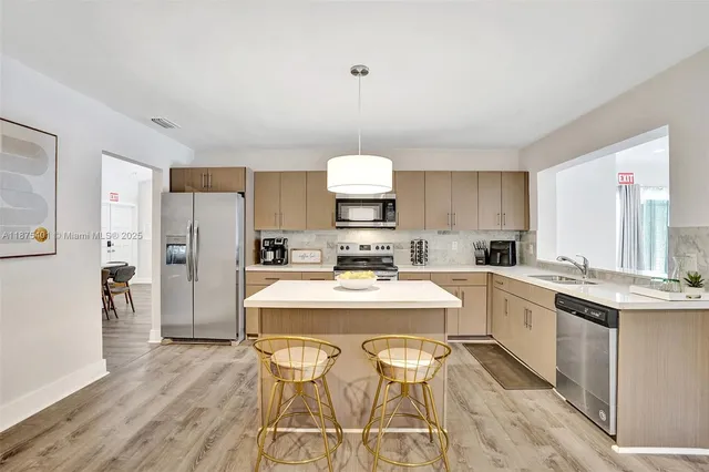 a view of a wrought iron fences in front of house