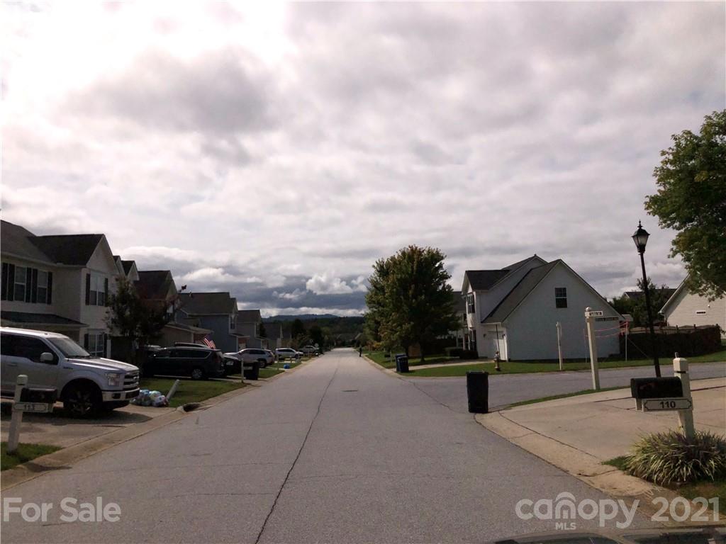 138 Yadkin Road, Unit 129 Fletcher, NC 28732 - Photo 12 of 37 a view of multiple houses with a street