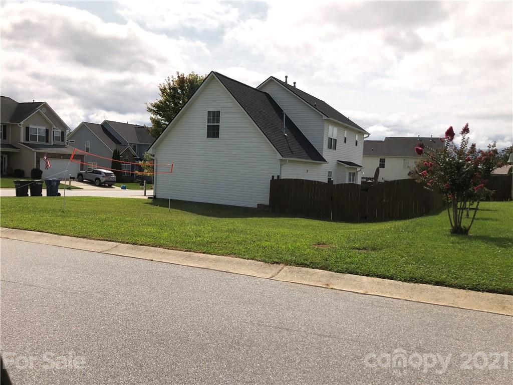 138 Yadkin Road, Unit 129 Fletcher, NC 28732 - Photo 17 of 37 a front view of house with yard and green space