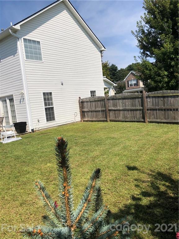 138 Yadkin Road, Unit 129 Fletcher, NC 28732 - Photo 23 of 37 a view of a terrace