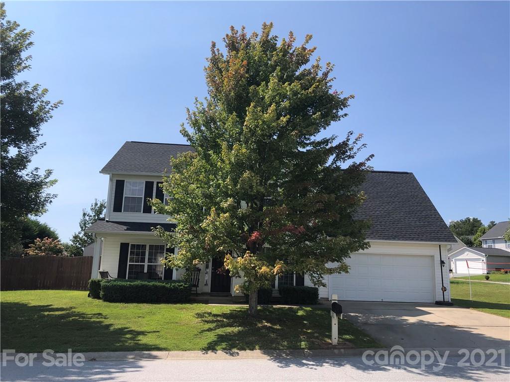 138 Yadkin Road, Unit 129 Fletcher, NC 28732 - Photo 26 of 37 front view of house with a yard
