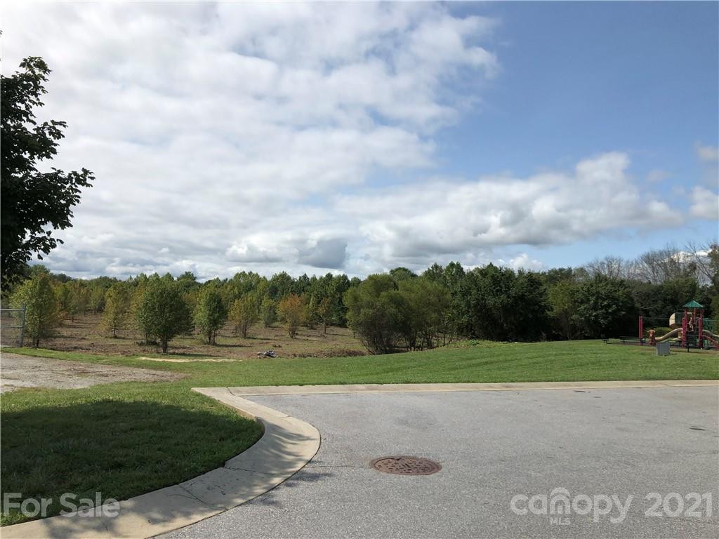 138 Yadkin Road, Unit 129 Fletcher, NC 28732 - Photo 32 of 37 a view of a grassy area
