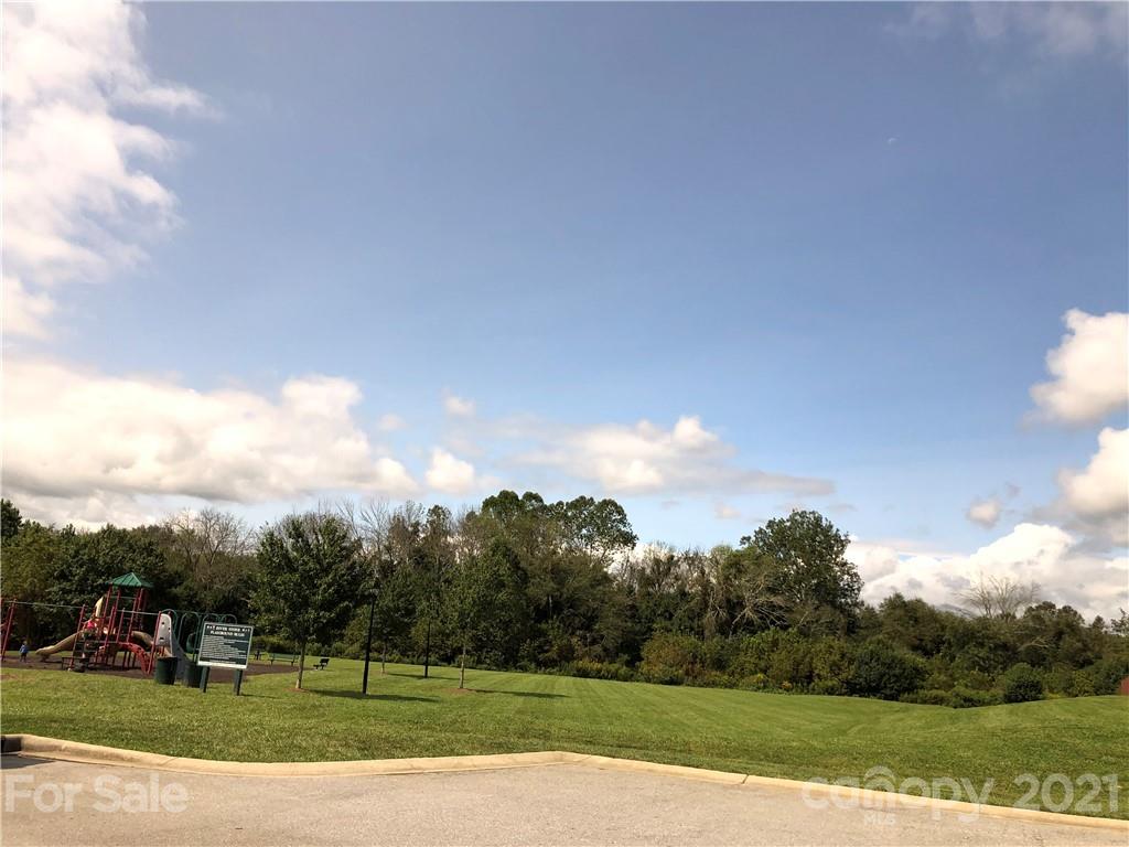 138 Yadkin Road, Unit 129 Fletcher, NC 28732 - Photo 35 of 37 a view of a golf course