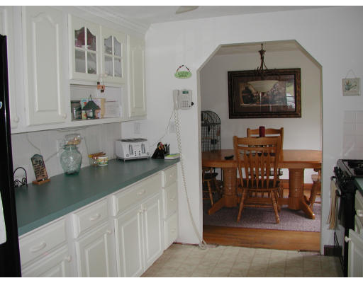 25 Rack Road Chelmsford, MA 01824 - Photo 3 of 8 a kitchen with a sink and a stove top oven