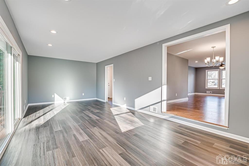 42 Norris Avenue Metuchen, NJ 08840 - Photo 17 of 39 a view of a livingroom with wooden floor