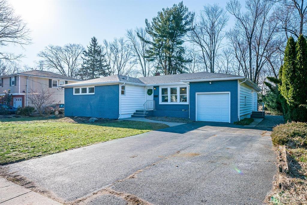 42 Norris Avenue Metuchen, NJ 08840 - Photo 2 of 39 a house with a yard