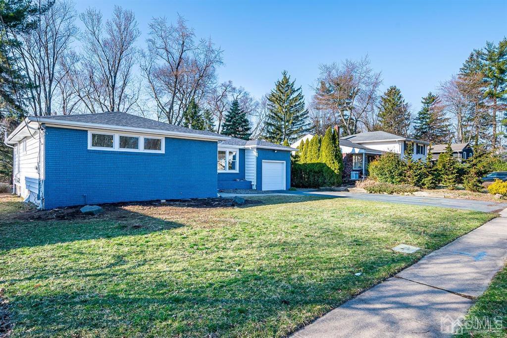 42 Norris Avenue Metuchen, NJ 08840 - Photo 3 of 39 a house view with a garden space
