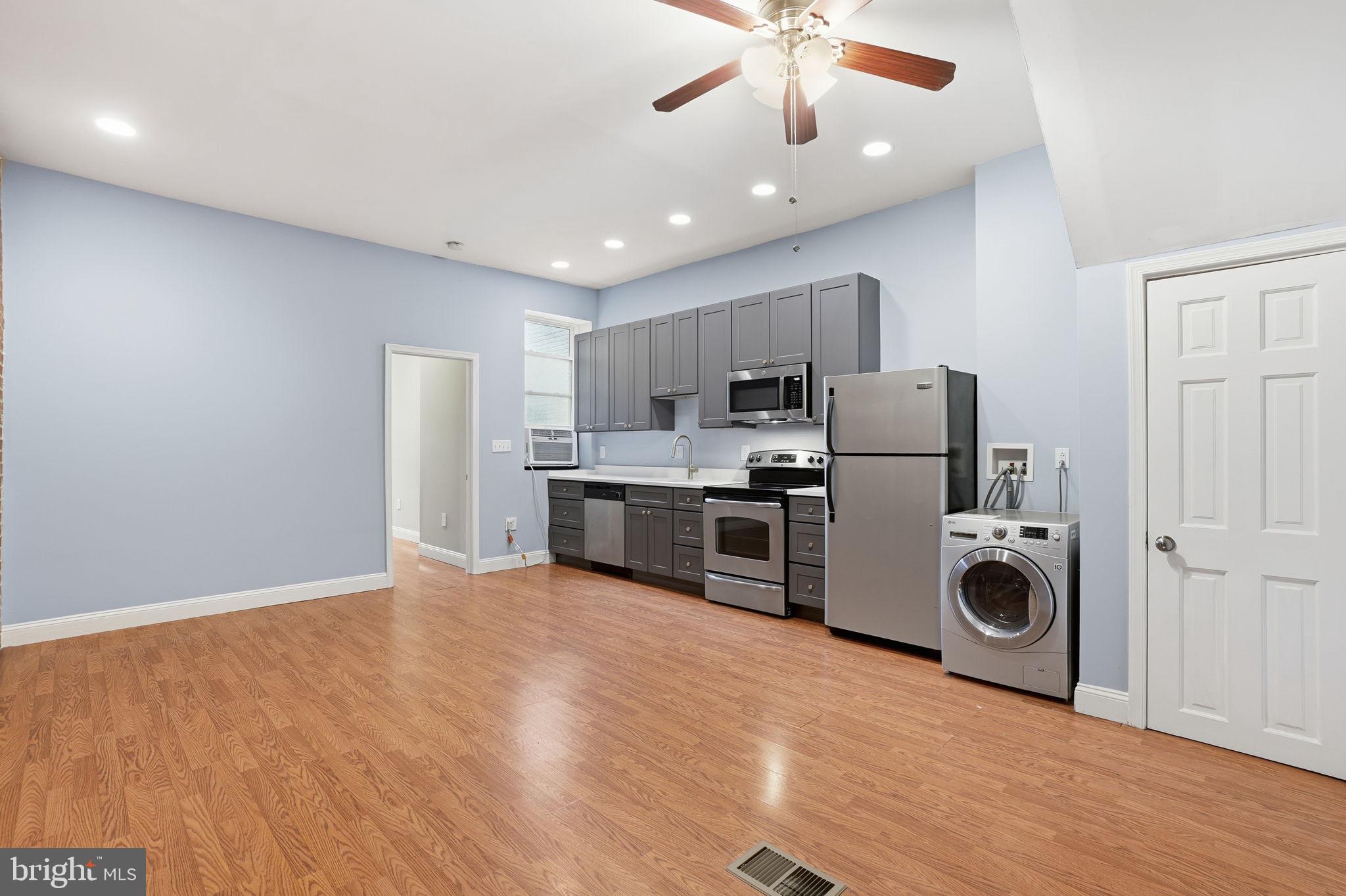 1440 Fairmont Street Northwest, Unit 3 Washington, DC 20009 - Photo 1 of 21 a view of kitchen and refrigerator