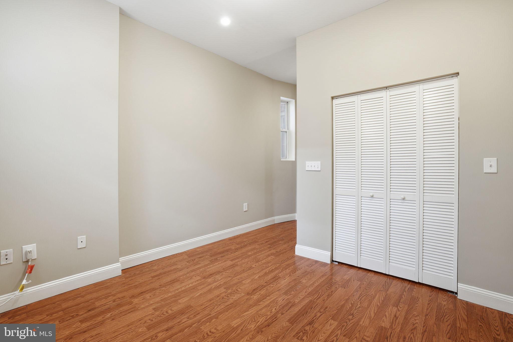 1440 Fairmont Street Northwest, Unit 3 Washington, DC 20009 - Photo 11 of 21 a view of an empty room with wooden floor
