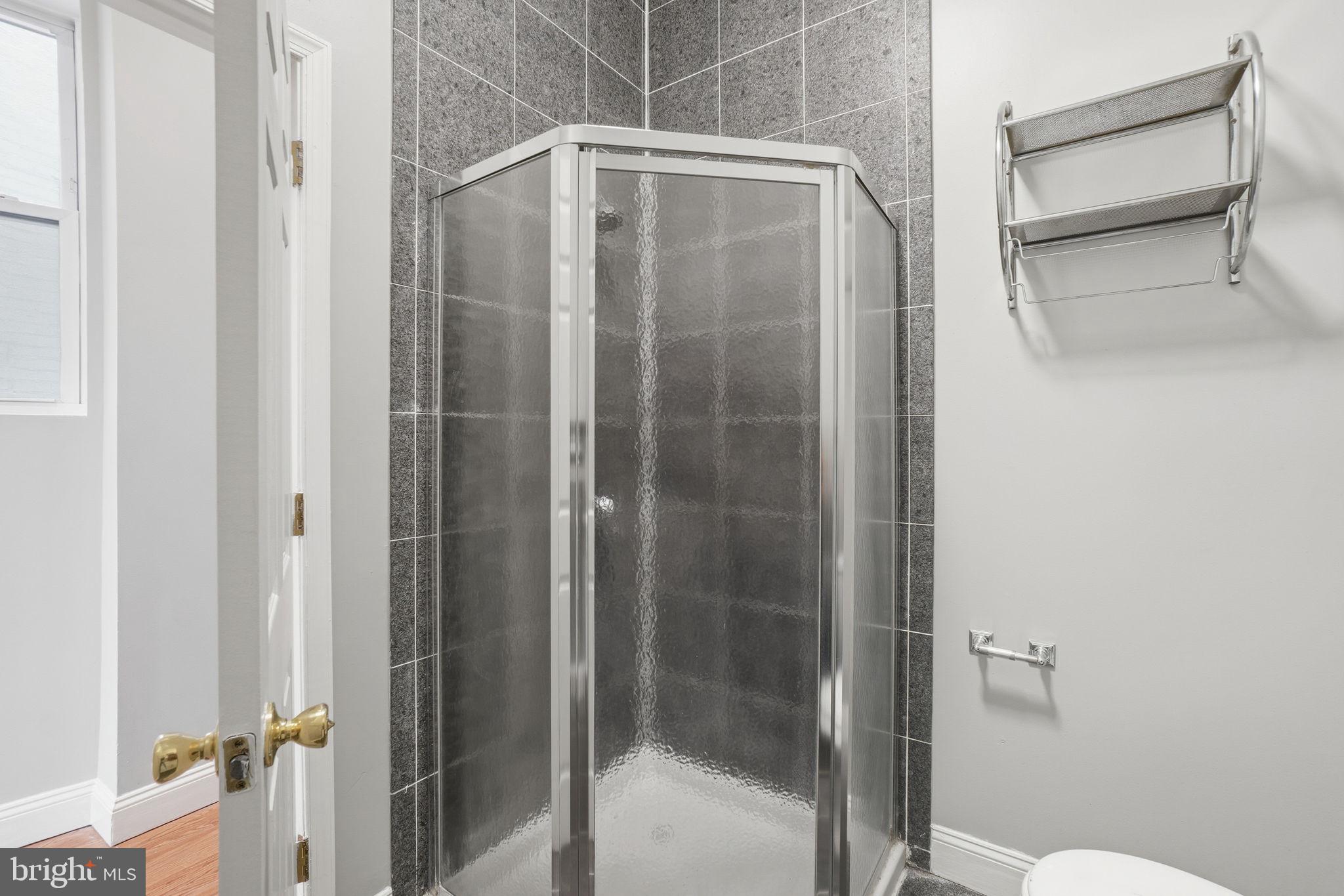 1440 Fairmont Street Northwest, Unit 3 Washington, DC 20009 - Photo 15 of 21 a bathroom with a shower