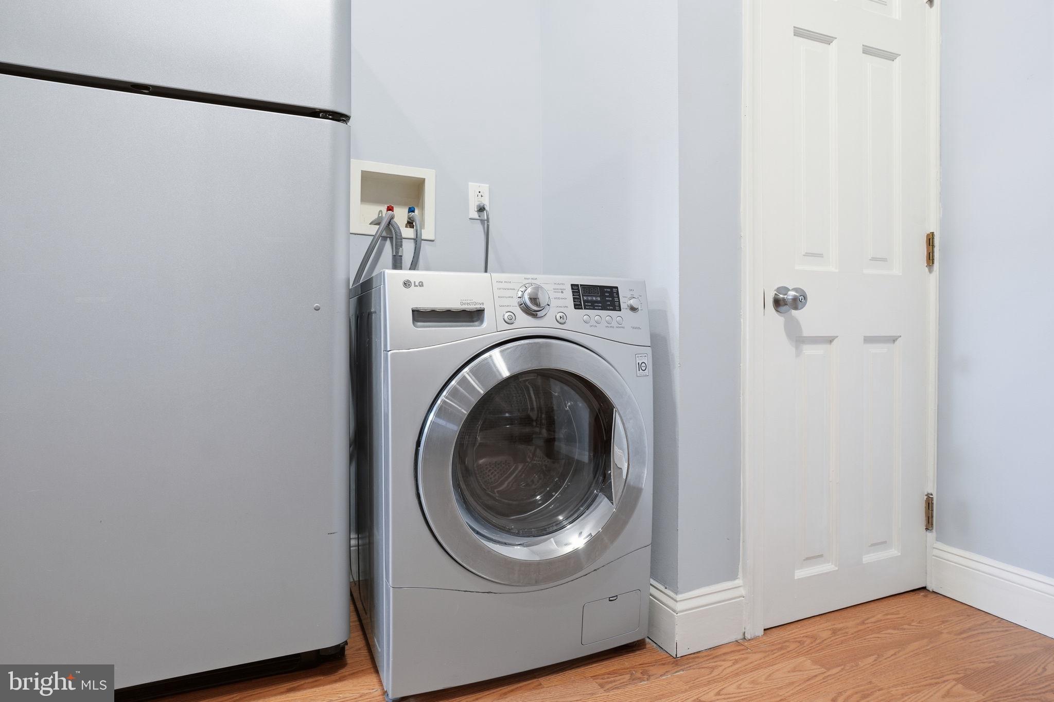 1440 Fairmont Street Northwest, Unit 3 Washington, DC 20009 - Photo 16 of 21 a utility room with dryer and washer