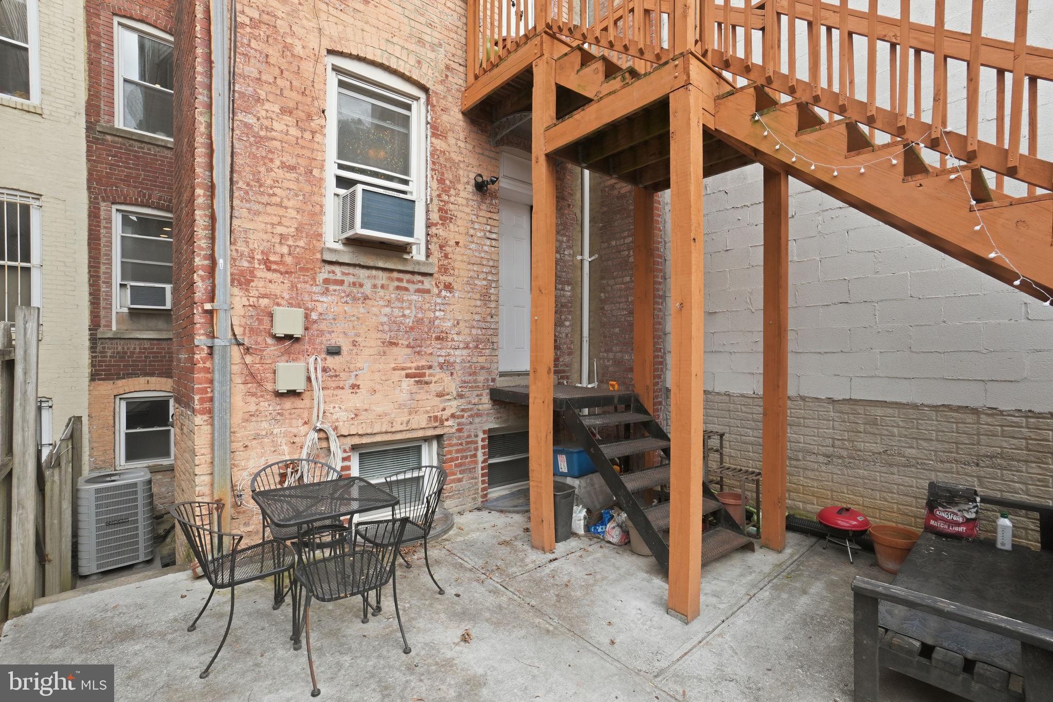 1440 Fairmont Street Northwest, Unit 3 Washington, DC 20009 - Photo 18 of 21 a backyard of a house with outdoor seating