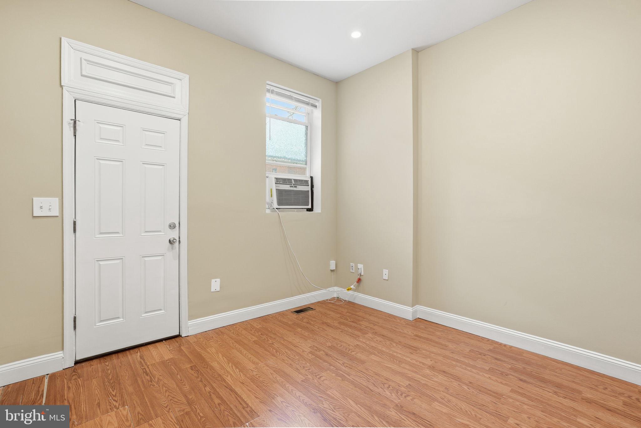 1440 Fairmont Street Northwest, Unit 3 Washington, DC 20009 - Photo 10 of 21 wooden floor in an empty room
