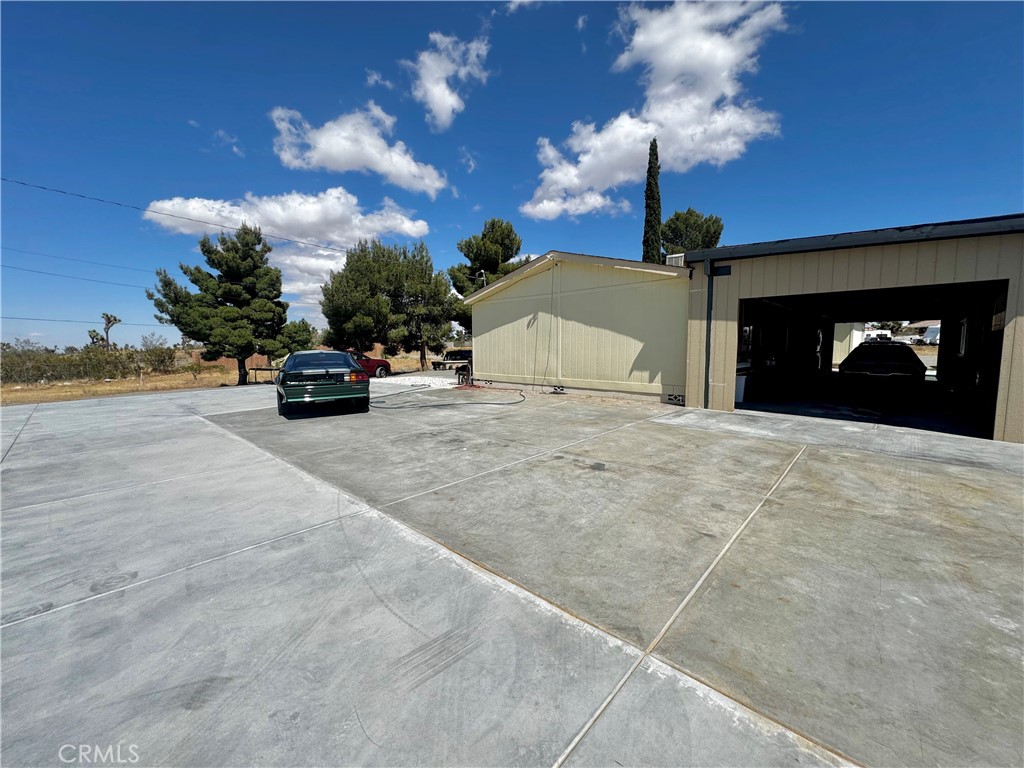 2775 Duncan Road Phelan, CA 92371 - Photo 2 of 29 a view of empty room with a fireplace