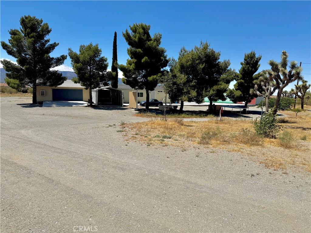 2775 Duncan Road Phelan, CA 92371 - Photo 26 of 29 a view of a swimming pool with a patio