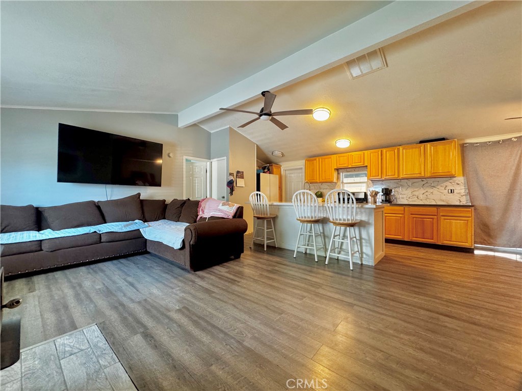 2775 Duncan Road Phelan, CA 92371 - Photo 4 of 29 a living room with furniture and a flat screen tv