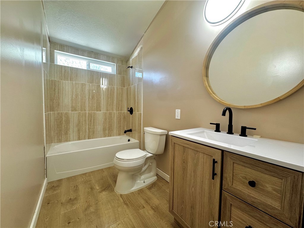 2775 Duncan Road Phelan, CA 92371 - Photo 9 of 29 a bathroom with a sink a toilet and shower