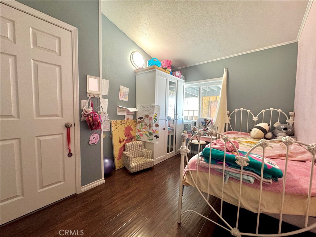 2775 Duncan Road Phelan, CA 92371 - Photo 10 of 29 a bedroom with bed and a window