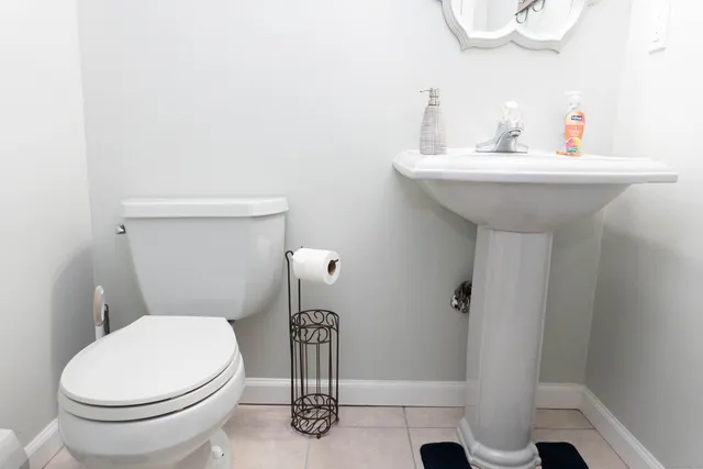 a bathroom with a sink and a toilet